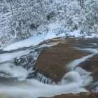 USA, Pennsylvania, Delaware Water Gap. Stream rapids and winter forest. Art Print